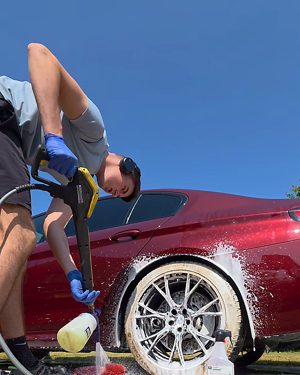 Mason detailing a car on location