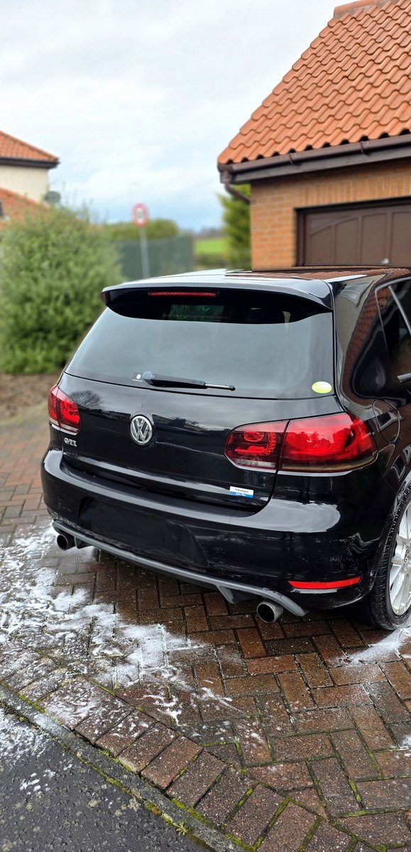 Volkswagen Golf GTI rear under snow foam