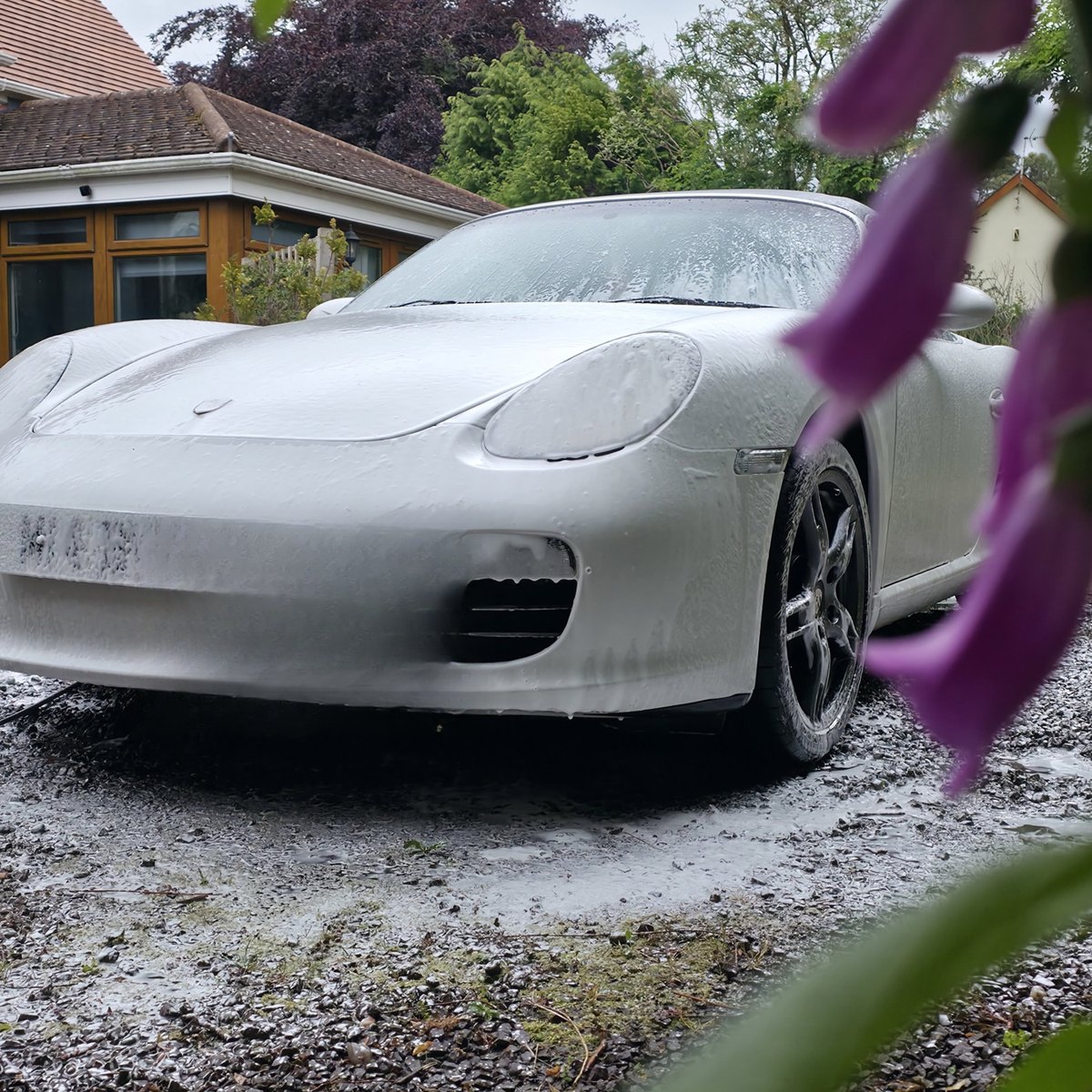 Porsche Panamera under snow foam