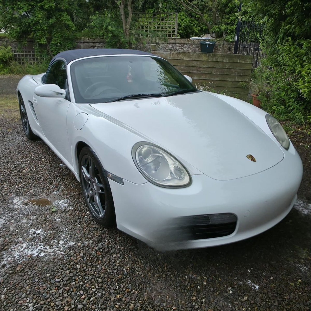 White Porsche Boxster detailed to a gloss